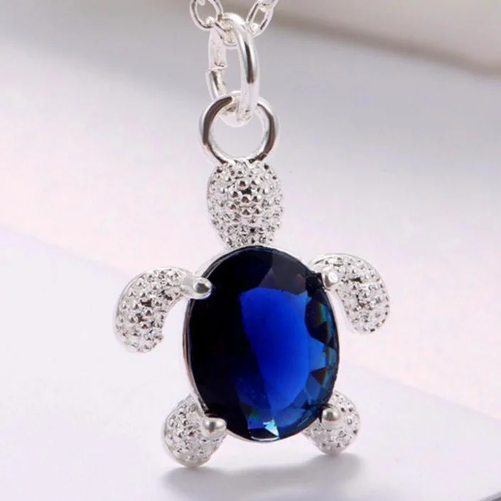 Pendentif Tortue sur fond naturel