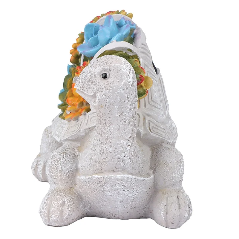 Statue Tortue Solaire - Fleurs illuminée la nuit