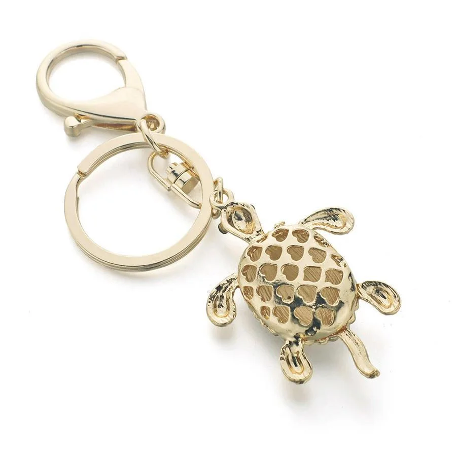 Porte-clé Tortue - Carapace Dorée dans la main