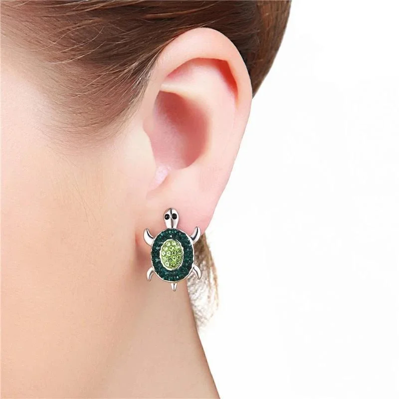 Boucles d'oreilles Tortue Captivante en détail