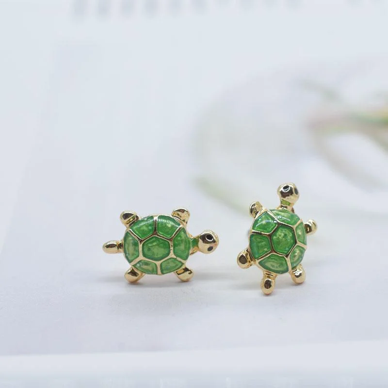 Boucles d'oreilles Tortue Cuty portées